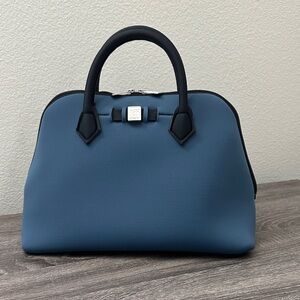 Save My Bag, blue foamy handbag. Made in Italy. Light weight. Washable. Used.